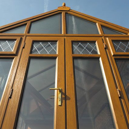 Golden oak woodgrain conservatory doors and glazed gable