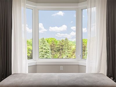 Bay window with a view of trees
